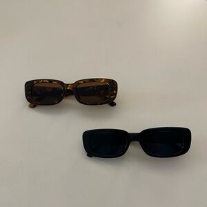 Pair of Black and Brown Tortoise Sunglasses